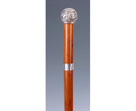 A 19th CENTURY SILVER HANDLED MALACCA SWORD STICK with silver embossed ball handle and later silver collar on Malacca cane en