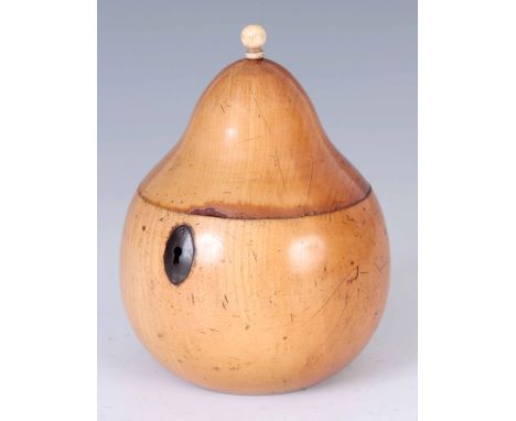 A GEORGIAN PEAR SHAPED TEA CADDY with steel escutcheon and hinge, original zinc foil interior having a later turned finial 15