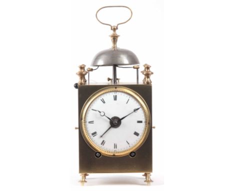 AN EARLY 19th CENTURY FRENCH CAPUCINE CLOCK the brass case with hinged side and back doors and mounted bell and carrying hand