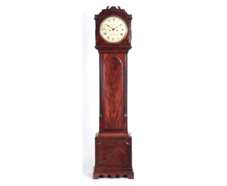 BATEMAN, LONDON. A REGENCY FLAMED MAHOGANY LONGCASE CLOCK the break arch top with shaped frieze above reeded canted corners o