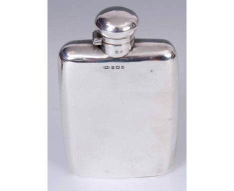 A GEORGE V LARGE SILVER HIP FLASK of plain rectangular slightly bowed form with twist fastening hinged cover 15.5cm long 9cm 