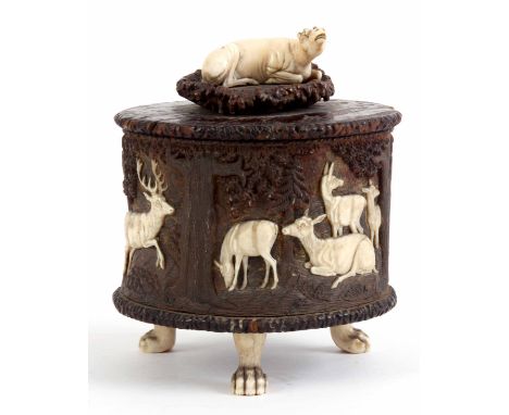 A FINELY CARVED 19th CENTURY SOUTH GERMAN IVORY, ANTLER AND BURR WOOD TEA CADDY/CASKET with a lift off lid mounted with a sea