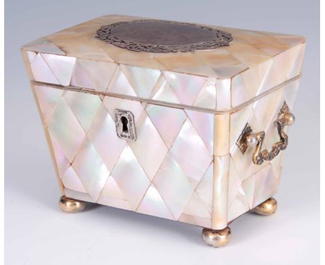 A 19TH CENTURY MOTHER OF PEARL SILVER MOUNTED TEA CADDY by Saunders & Shepherd Chester 1895 with silver gilt handles.