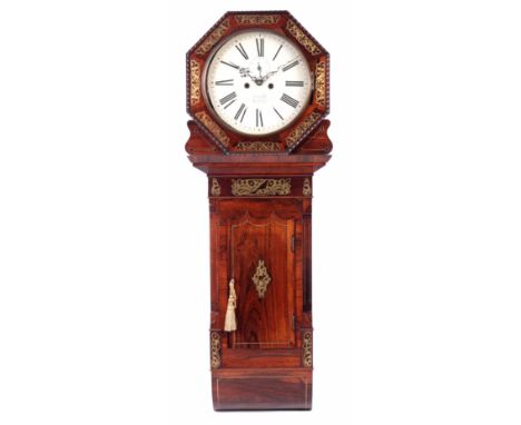 A REGENCY ROSEWOOD AND BRASS INLAID TAVERN STYLE WALL CLOCK the octagonal surround with brass pierced inlaid panels and gadro