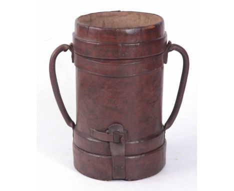 A LARGE WW1 LEATHER SHELL CARRIER with two carrying handles, marked R.C.D with a BROAD ARROW, having a removable base 58cm hi