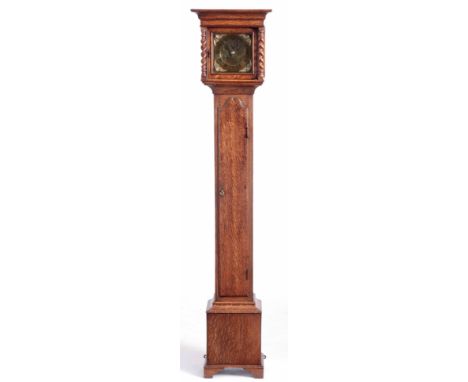 A LATE 19th CENTURY OAK CASED GRANDDAUGHTER CLOCK hood with barley twist columns on slender trunk and box base enclosing a 7"