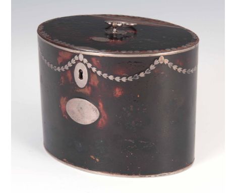 A GEORGIAN SILVER MOUNTED OVAL FAUX TORTOISESHELL TEA CADDY with a silver hinge, escutcheon and handle 10cm high 13cm wide 10
