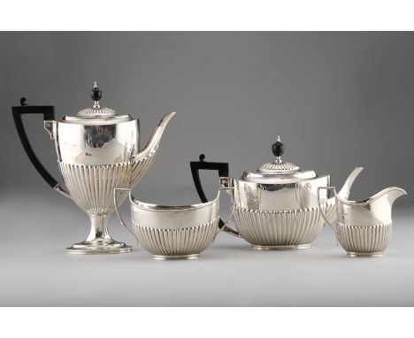 Late Victorian silver four piece tea service, oval shaped, part fluted, assay marked London 1900, approx. 54ozs