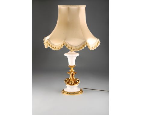 Gilt metal and white marble table lamp and shade, the column in the form of four dolphins 
