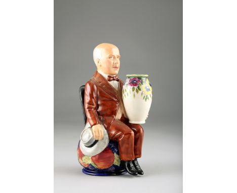 Limited Edition ceramic figure of William Moorcroft holding a vase by Kevin Francis Ceramics, Staffordshire, Limited Edition 