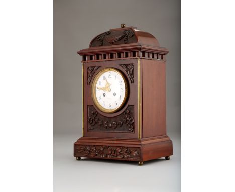 Carved Mahogany cased mantel clock, retailed by J. Cameron and Son, Kilmarnock, white enamel circular dial, French time piece