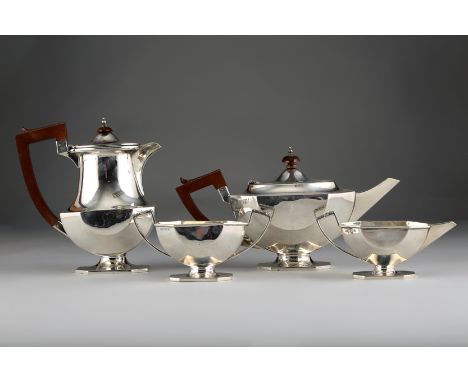 Art Deco 1930s four piece silver tea service, faceted form raised on rectangular feet with canted corners, assay marked Birmi