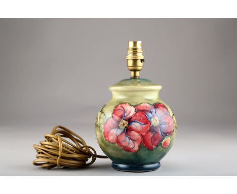 Moorcroft pottery table lamp, decorated with hibiscus. 16.5cm high 