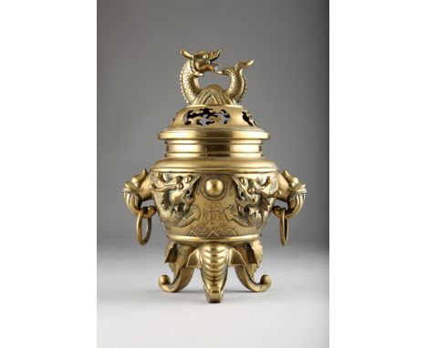 Large 20th Century Chinese bronze censer with pierced cover, dragon finial to cover, mystical masks with hooped handles and d