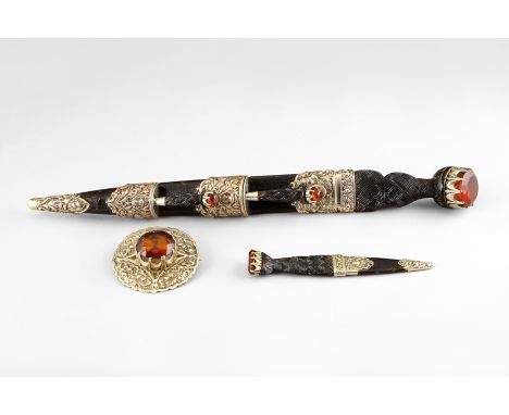 Scottish electro plated silver mounted dirk, embossed thistle decoration and set with Citrines to handles, stamped Lawrie Gla