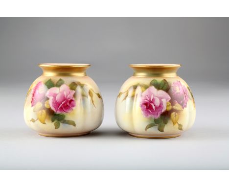Pair of Royal Worcester vases, squat and lobbed form, hand painted with mixed roses, date coded 1918, 8cm high 