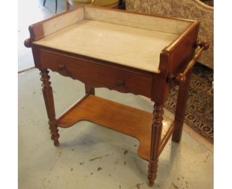 WASHSTAND, 19th century Continental with a marble splashback flanked by a towel rail to each side and a frieze drawer over a 