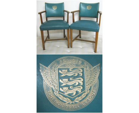 FOOTBALL ASSOCIATION ARMCHAIRS, a pair, from the disciplinary meeting room at the old Lancaster gate HQ, with blue leather up