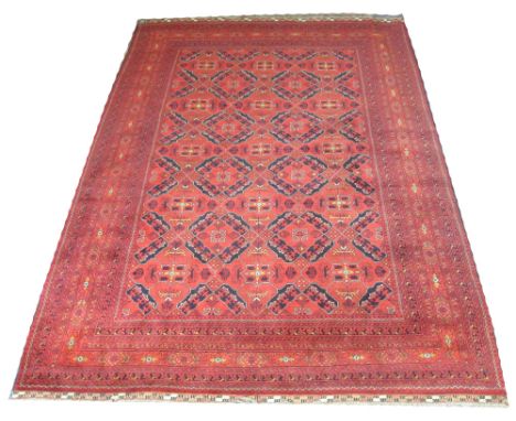 TEKKE TURKOMAN CARPET, 300cm x 210cm, all over gul decoration within multiple bands and borders with unusual checkered kilim 