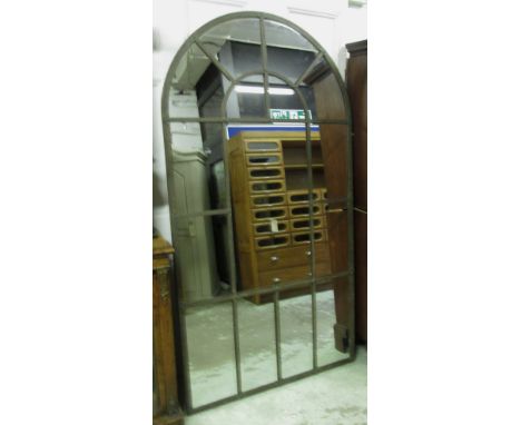 ARCHITECTURAL STYLE MIRROR, distressed metal framed of large proportions with an arched top, 109cm W x 207cm H. 