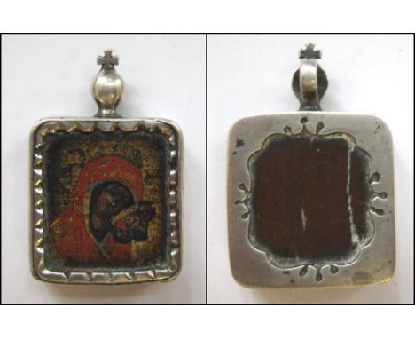 MINIATURE ICON, depicting Mother of God and Christ on wooden panel within a silver coloured metal pendant surround, 4cm H x 2