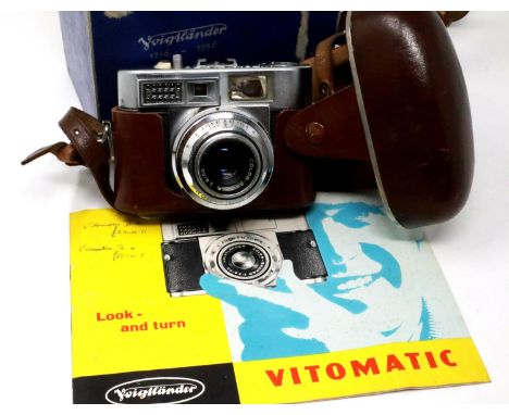 Boxed Vitomatic II camera, with brown leather case and manual. P&amp;P Group 2 (£18+VAT for the first lot and £3+VAT for subs