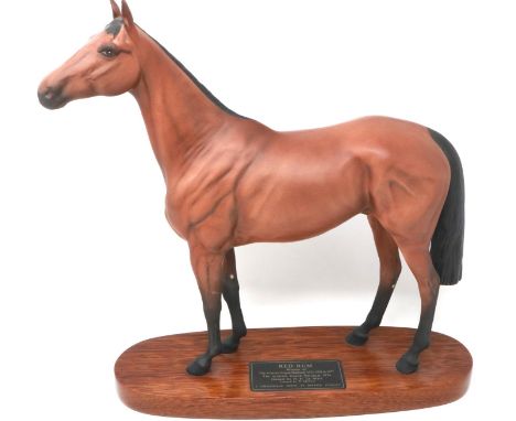 Beswick Connoisseur model, Red Rum, raised on wooden plinth, overall H: 32 cm, one ear reglued. P&amp;P Group 2 (£18+VAT for 