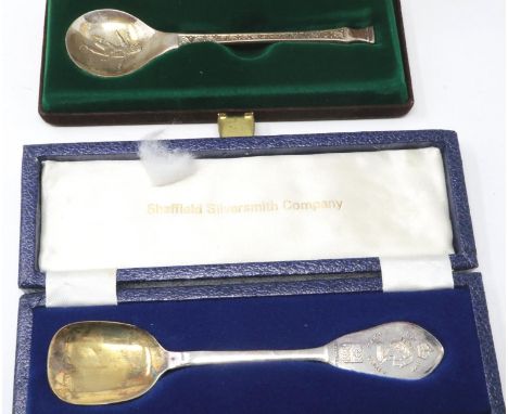 John Pinches hallmarked silver 1976 Christmas spoon, 31g, together with a Queen Elizabeth The Second roman numerals commemora