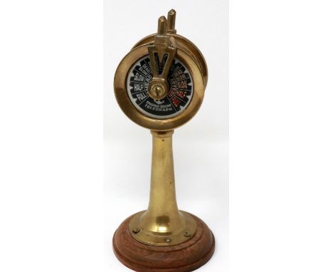 A miniature brass engine room telegraph raised on a turned wood plinth, H: 15 cm. P&amp;P Group 1 (£14+VAT for the first lot 