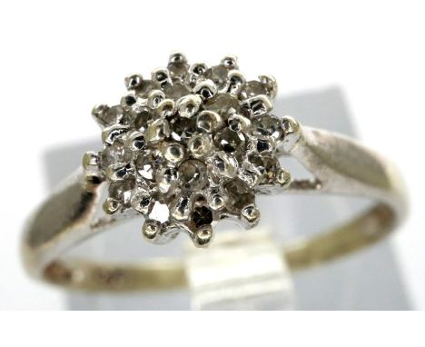 9ct white gold diamond cluster ring, size K, 1.5g. P&amp;P Group 1 (£14+VAT for the first lot and £1+VAT for subsequent lots)