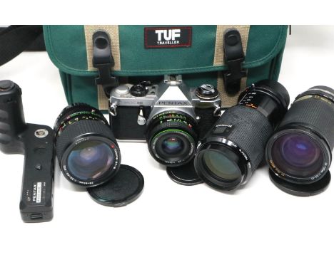 Pentax ME Super camera, a Pentax winder and three further lenses in a TUF Traveller camera bag. P&amp;P Group 2 (£18+VAT for 