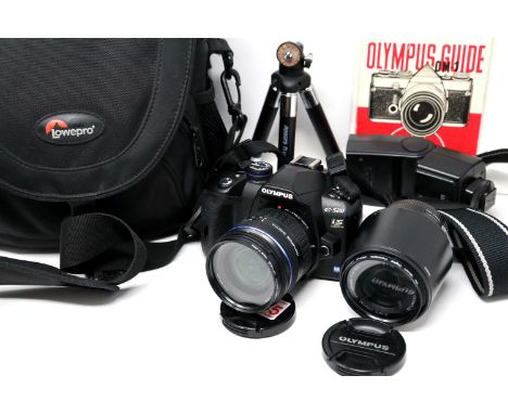 Olympus E520 digital camera, Olympus OM1 guide, lens, Jessops mini tripod and a Lowepro bag (6). P&amp;P Group 3 (£25+VAT for