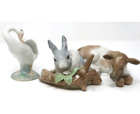 Three Lladro animal figurines, including The Nativity Cow, largest H: 12 cm, no cracks or chips. P&amp;P Group 2 (£18+VAT for