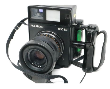 Polaroid 600 SE press camera viewfinder, optics clear. P&amp;P Group 2 (£18+VAT for the first lot and £3+VAT for subsequent l