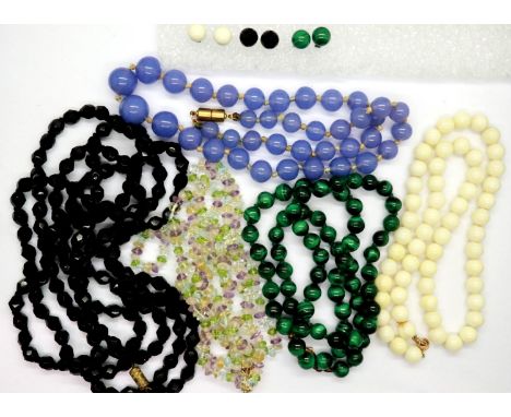 Hardstone necklaces including Malachite and Onyx examples, some with earring sets (5). P&amp;P Group 1 (£14+VAT for the first