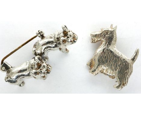 Two dog form brooches, one 925 silver and one white metal, largest L: 35 mm. P&amp;P Group 1 (£14+VAT for the first lot and £