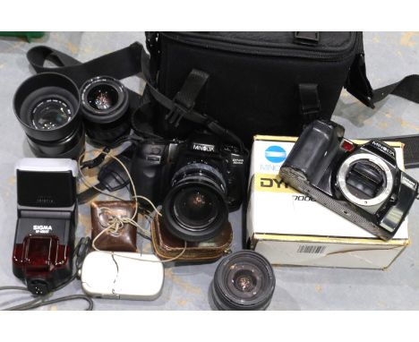 Extensive Minolta outfit with various lenses, carry bag, and a Sigma EF-430 ST flash. P&amp;P Group 3 (£25+VAT for the first 