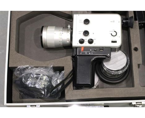 Cased Braun Nizo Super 8 movie camera with accessories, no damage to body of the camera and lens appears clear. P&amp;P Group