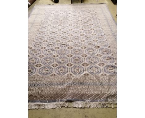 A very large Super Kazak grey-blue ground multi-bordered woven silk and wool carpet (Mayfair Carpet Gallery), 370 x 270cm