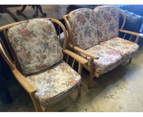 An Ercol style beech two piece lounge suite, settee 116cm, depth 74cm, height 80cm