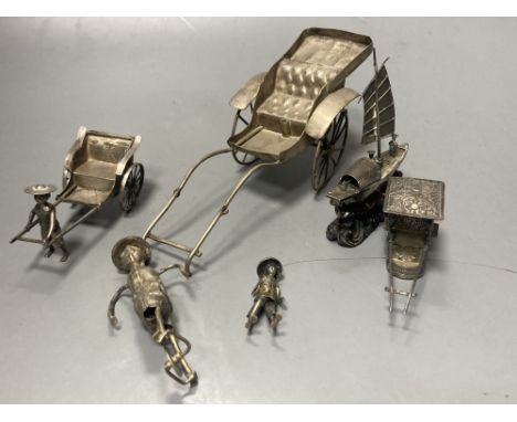 A group of Chinese white metal models of a sampan by Wang Hing, rickshaw and sedan chair etc.CONDITION: Sampan missing a flag