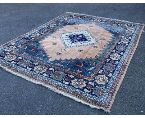 A Persian Shah-Savan carpet, 331 x 268cm