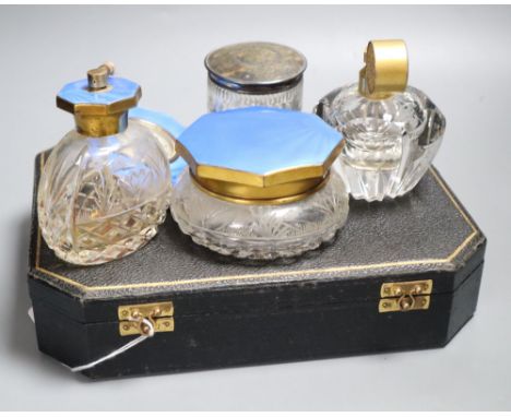 A collection of dressing table items, including a Marcel Franck cut glass atomiser with gilt metal fittings, a three-piece si