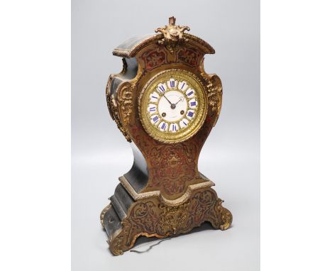 A 19th century French red boullework mantel clock, by Marshall &amp; Fils, height 45cm