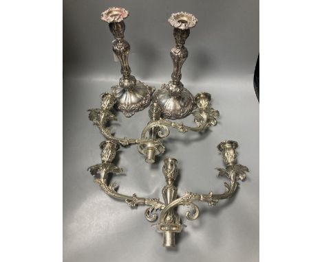A pair of early Victorian silver candlesticks, indistinct maker's mark, Sheffield, 1840, 29cm, weighted (a.f.), together with