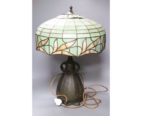 A spelter lamp with Tiffany style shade