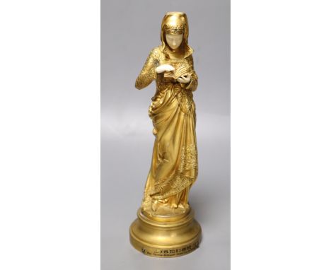 After Carrier-Belleuse. A gilt bronze and ivory figure, height 25cmCONDITION: Jewels missing from head-dress and sleeve