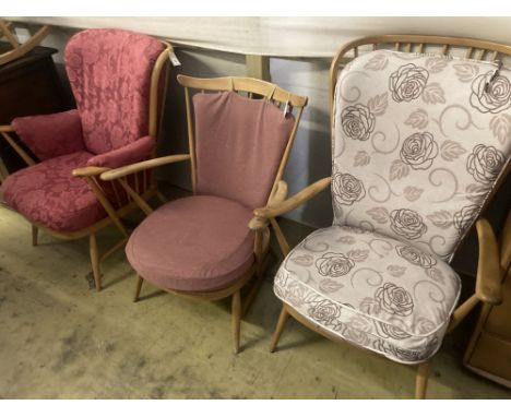 Three Ercol stickback beech open armchairs, largest width 72cm depth 80cm height 102cm