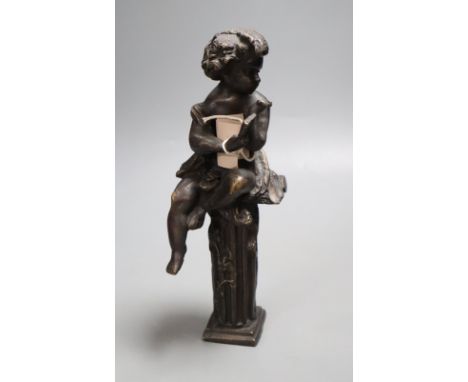 A decorative bronze cherub on pedestal, height 26cm