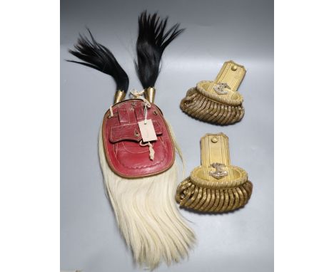 A pair of naval epaulettes and a Military sporran